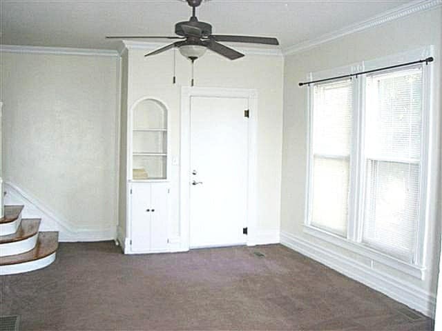 Living Room with Built-Ins and Large Windows - 1106 George St