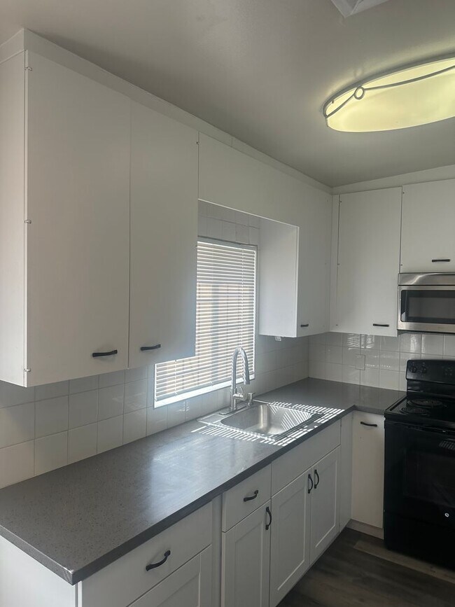 Building Photo - NLV!! Single Story!! 3 Bedrooms!! Carport!!! Big Lot!! Patio In Back yard!! No Carpet!! Vinyl Pla...