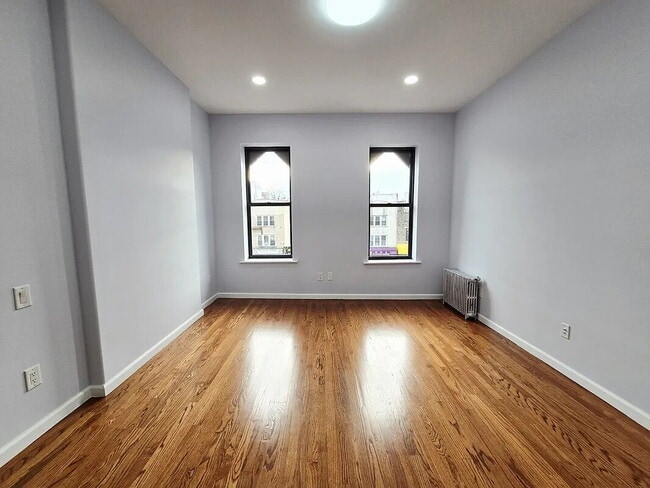 Building Photo - sunny, renovated, rent-stabilized one-bedroom apartment