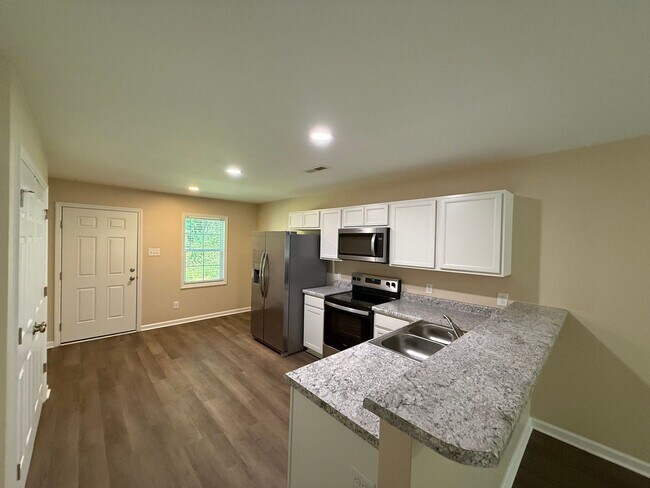 Building Photo - Nice 2 bedroom, 2 bath duplex. No pets allowed.