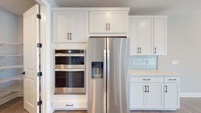 Building Photo - Exceptional Nearly New Toll Brothers Home in a Gated St. Augustine Community -4 Car Garage!