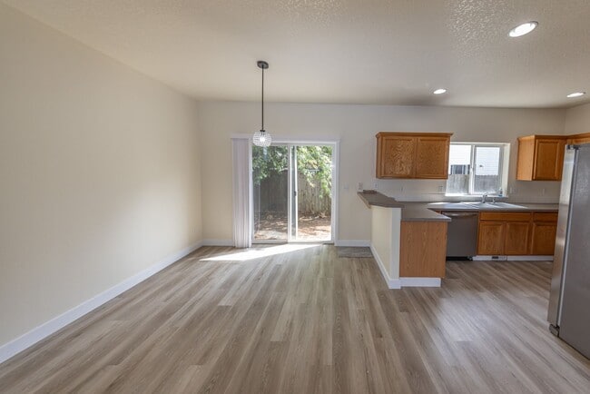 Building Photo - Three bedroom home in Orchards. - JUST UPDATED