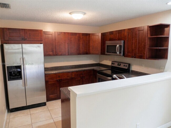 Building Photo - 10731 NW 16th Ct