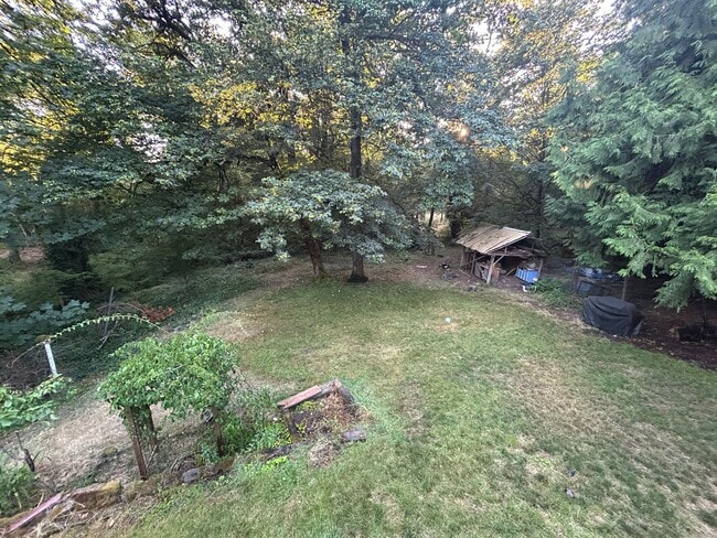 Building Photo - 5 bed, 2 bath Covington Home w/2-car garag...
