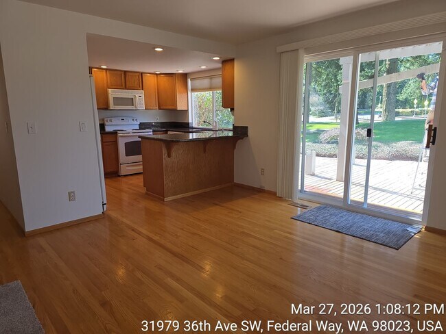 Building Photo - Twin Lakes life on a golf course -4 level home -  4 bedroom 2.5 bathroom with 2 car garage - Move...