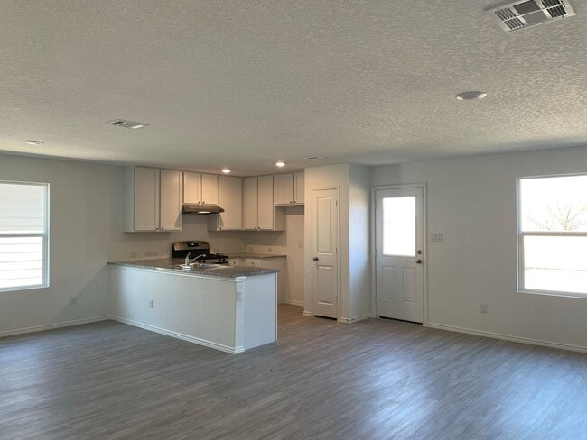 Building Photo - Spacious 4-Bedroom Home with Huge Backyard...