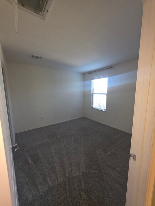 Building Photo - COMING SOON! New 3BR 2 BA Home w/ 2-Car Garage • Stainless Kitchen • Timer-Irrigated Yard in East...