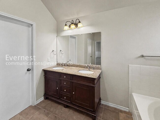 Building Photo - Charming 4-Bedroom Haven with Fireplace and Serene Outdoor Living / Pet-Friendly / Available Now!