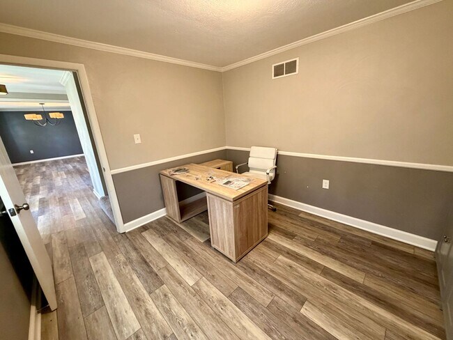Building Photo - Modern Comforts Await: Spacious Rental with 2-Car Garage, Private Office, and Finished Basement w...