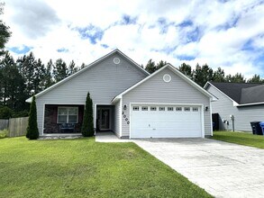 Building Photo - An adorable home within the City!