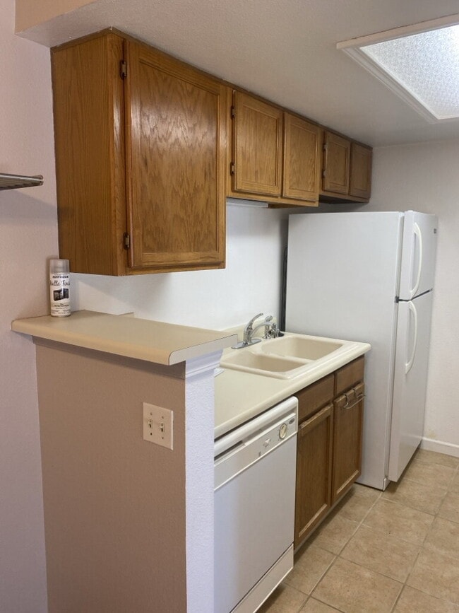 Building Photo - "Charming 1-Bedroom Condo with Cozy Fireplace and Garage in Prime Denver Location!"  Available Now!
