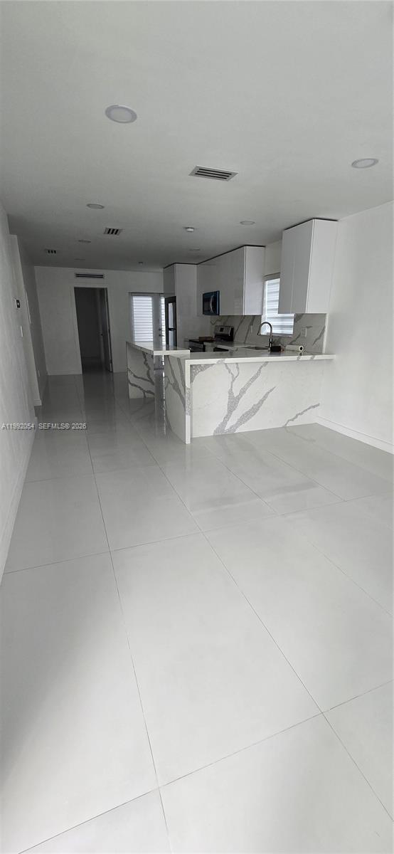 Building Photo - 1284 W 38th Pl