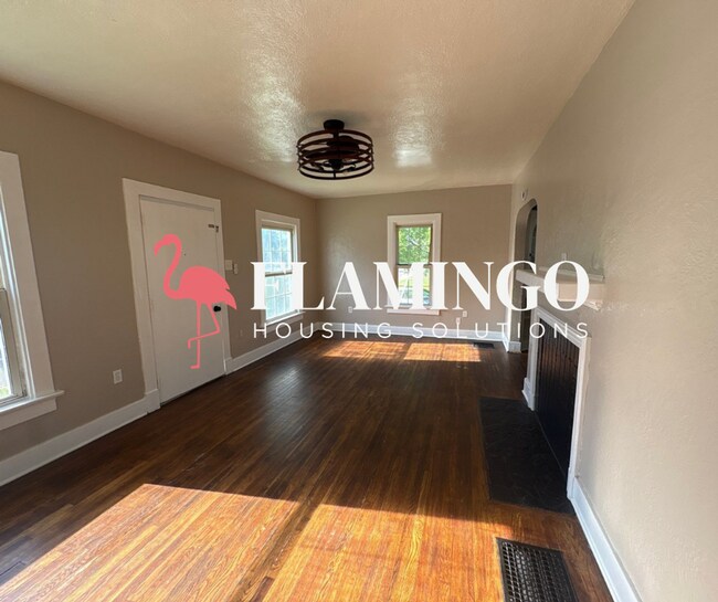 Building Photo - Charming 2 Bedroom, 1 Bath Home – Refinished Hardwood Floors, Detached Garage & More!