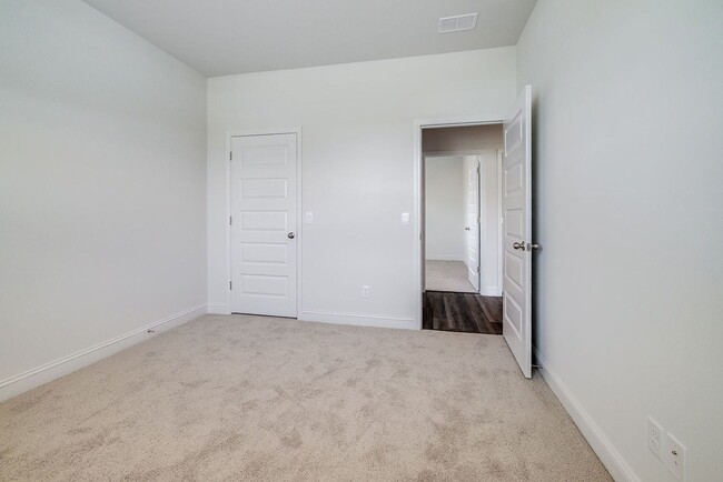 Building Photo - Beautiful 4BR Home in Woodland Trail – Top...