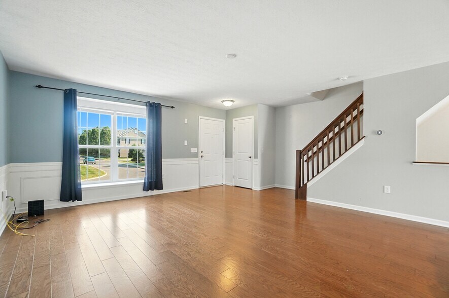 Living room with coat closet - 6169 Needletail Rd
