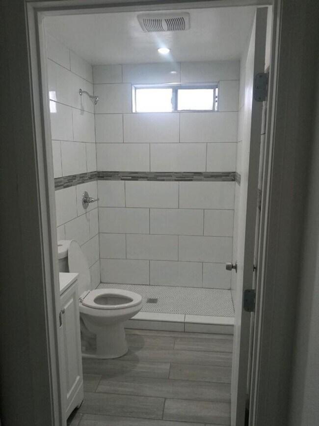 Building Photo - Welcome to 105th Homes, a thoughtfully des...