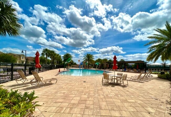 Building Photo - EAGLE CREEK LAKE NONA! WELCOME HOME! Beautiful water views! Spacious 2 story-3 bedroom 2.5 bath h...