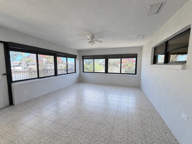 Building Photo - "Waterfront Home with Dock! 3-Bedroom Oasis with 2 Baths and 1,800 Sq Ft of Comfort in Hudson, FL!"