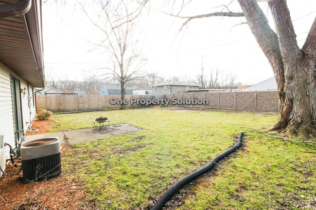 Building Photo - 1637 E 33rd Ave
