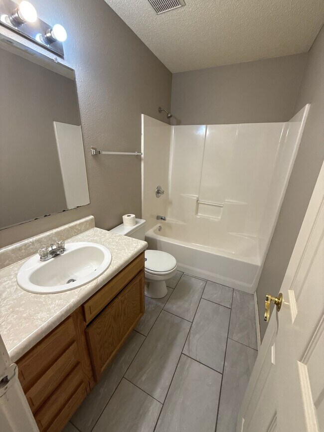 Building Photo - 3 bed, 2 bath, 2 car garage House, yard care included