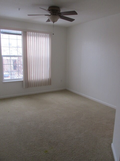 Building Photo - NEW CARPET NEW PAINT!! Clean and Bright 2BR 2BTH Condo Close To DIA. Gated Community in First Cre...