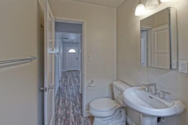 Building Photo - CHARMING & AIRY HOME W/ SPACIOUS FENCED YARD & LARGE 2-CAR GARAGE CLOSE TO SCHOOLS, SHOPPING & MI...