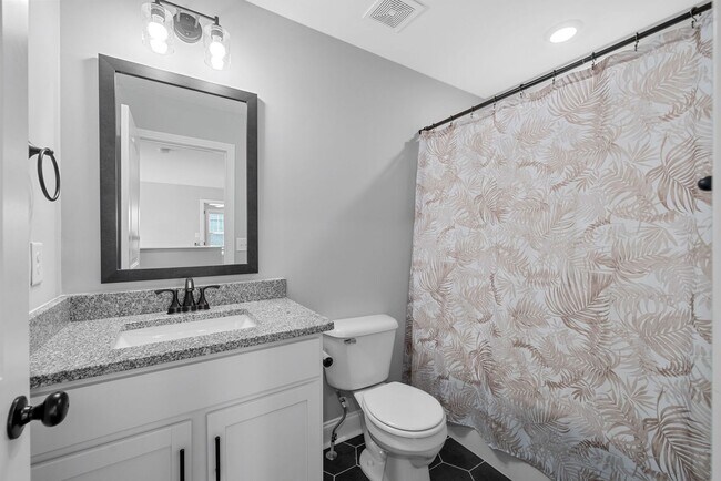 Building Photo - Pet Friendly Four Bedroom with Bonus!