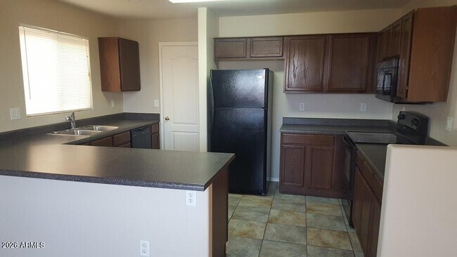 Building Photo - 12926 W Fleetwood Ln
