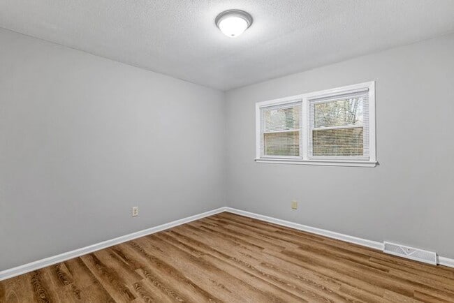 Building Photo - McLeansville - Minutes from Elon & Greensboro! Few Acres, Brick Duplex, Just Painted, New Carpet,...