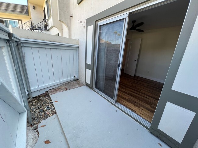 Building Photo - TWO PARKING SPACES INCLUDED! In Unit Washer & Dryer! Large Private Patio for Bikes, Boards and Bb...