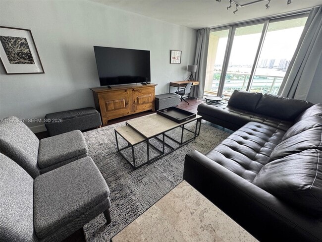 Building Photo - 19380 Collins Ave