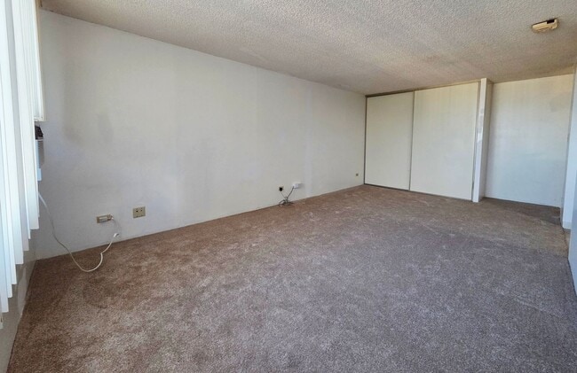 Building Photo - Pearlridge Square - Studio, 1 bath unit w/ 1 covered parking stall