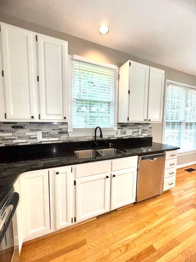 Building Photo - Spacious 4BR 2.5BA Home in Adams Farm with...