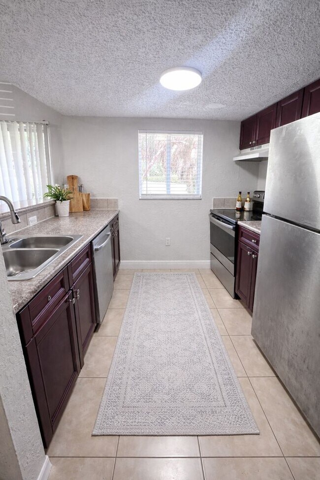 Building Photo - 3 bd/2.5 ba + Stainless Steel Appliances + 1 Car Garage + up to 3 Months Off!
