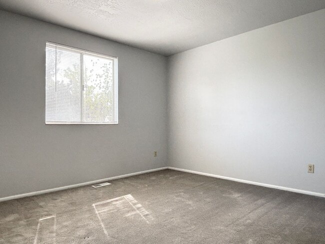 Building Photo - Cozy Home with New Paint & Flooring!
