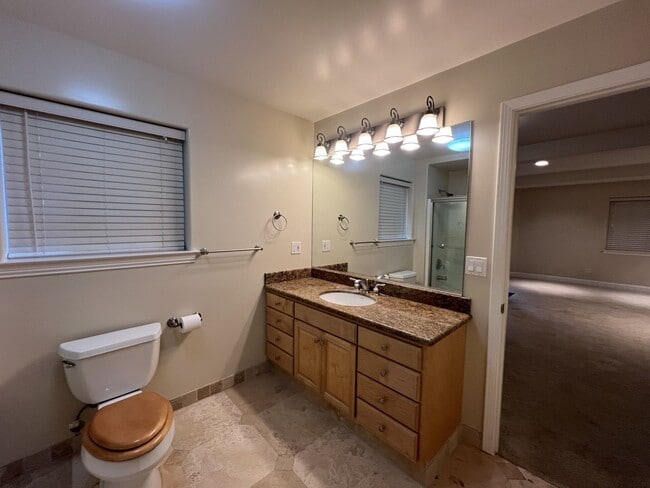 Building Photo - 2,280 Square Foot modern Three bedroom two bath multi  level home, large yard, decks, cathedral c...