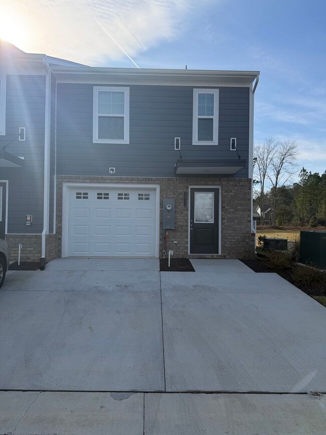 Building Photo - Modern Two-Story Townhome with Open Floor Plan and Garage