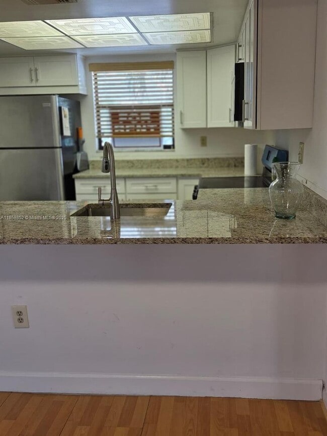 Building Photo - 10823 NW 7th Street 22-44, Miami, FL 33172