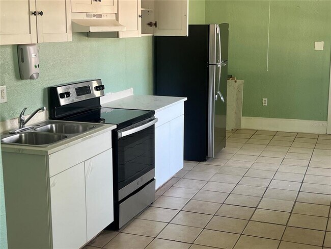 Building Photo - 2002 E 33rd Ave