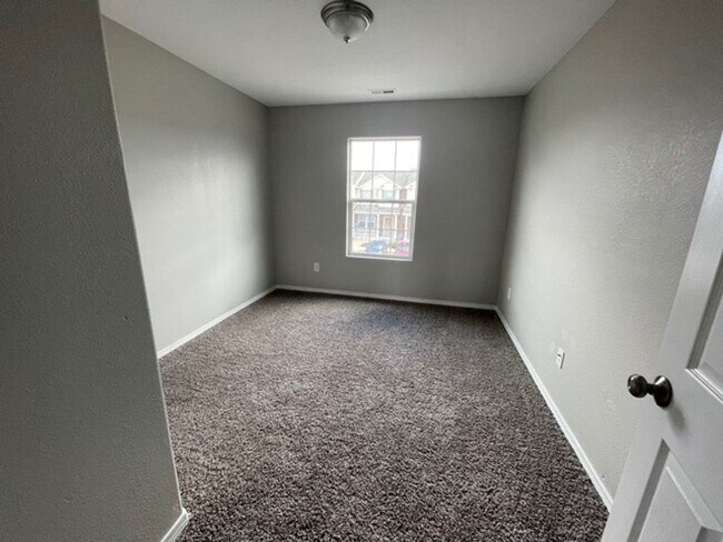 Building Photo - Welcome home to this beautifully upgraded 3-bedroom, 3-bath Townhome near Fort Carson