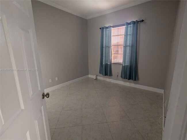 Building Photo - Northwest 91st Court, Hialeah Gardens, FL 33018 - 3 BR 1 BA single-family home