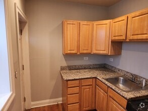 Building Photo - 1224 N Cicero - 1 Bed