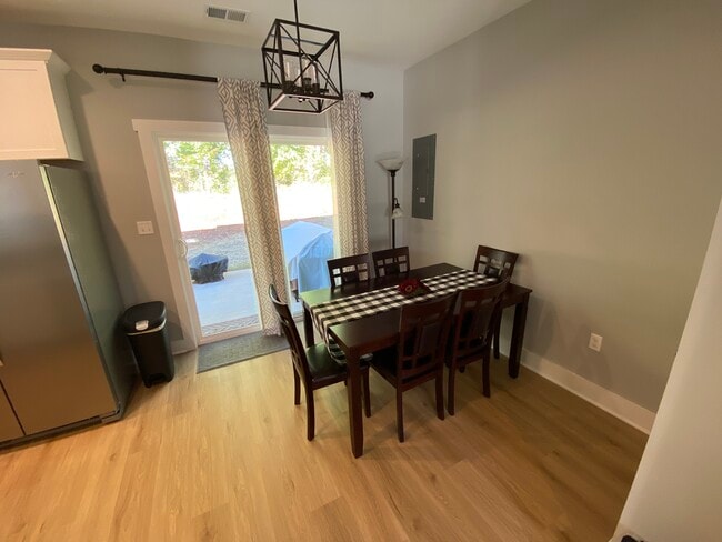 Eat in kitchen with room for a dining table, back door to back patio - 140 Sunburst Villa Dr