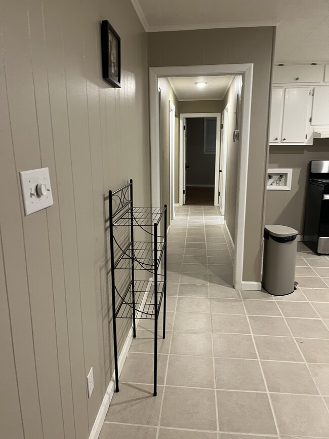 Kitchen looking down hallway - 415 Rogers Rd