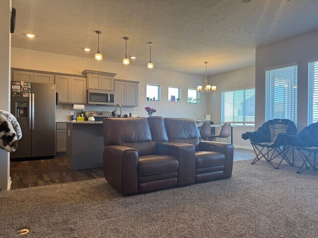 Building Photo - Spacious 4-Bedroom Ranch with Finished Basement & 3-Car Garage