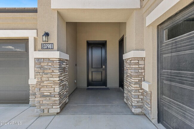 Building Photo - 37981 W Montserrat St