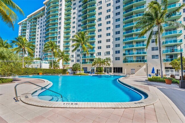 Building Photo - 19390 Collins Ave