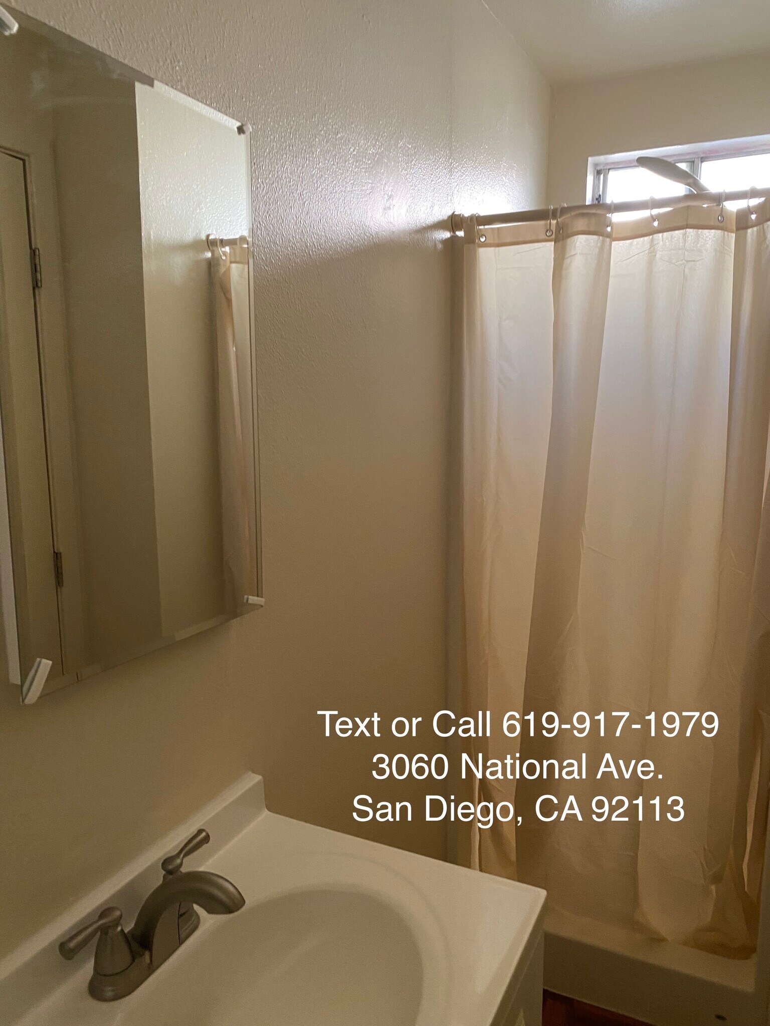 1 of 2 Bathroom - 3060 National Ave