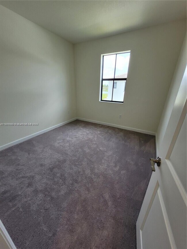 Building Photo - 11125 West 33rd Ct