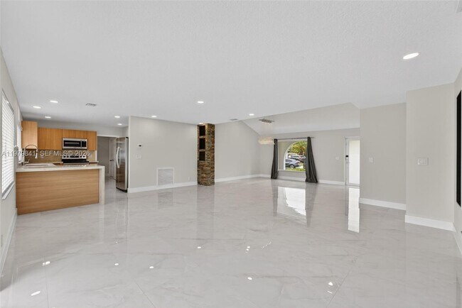 Building Photo - 8695 SW 51st Pl